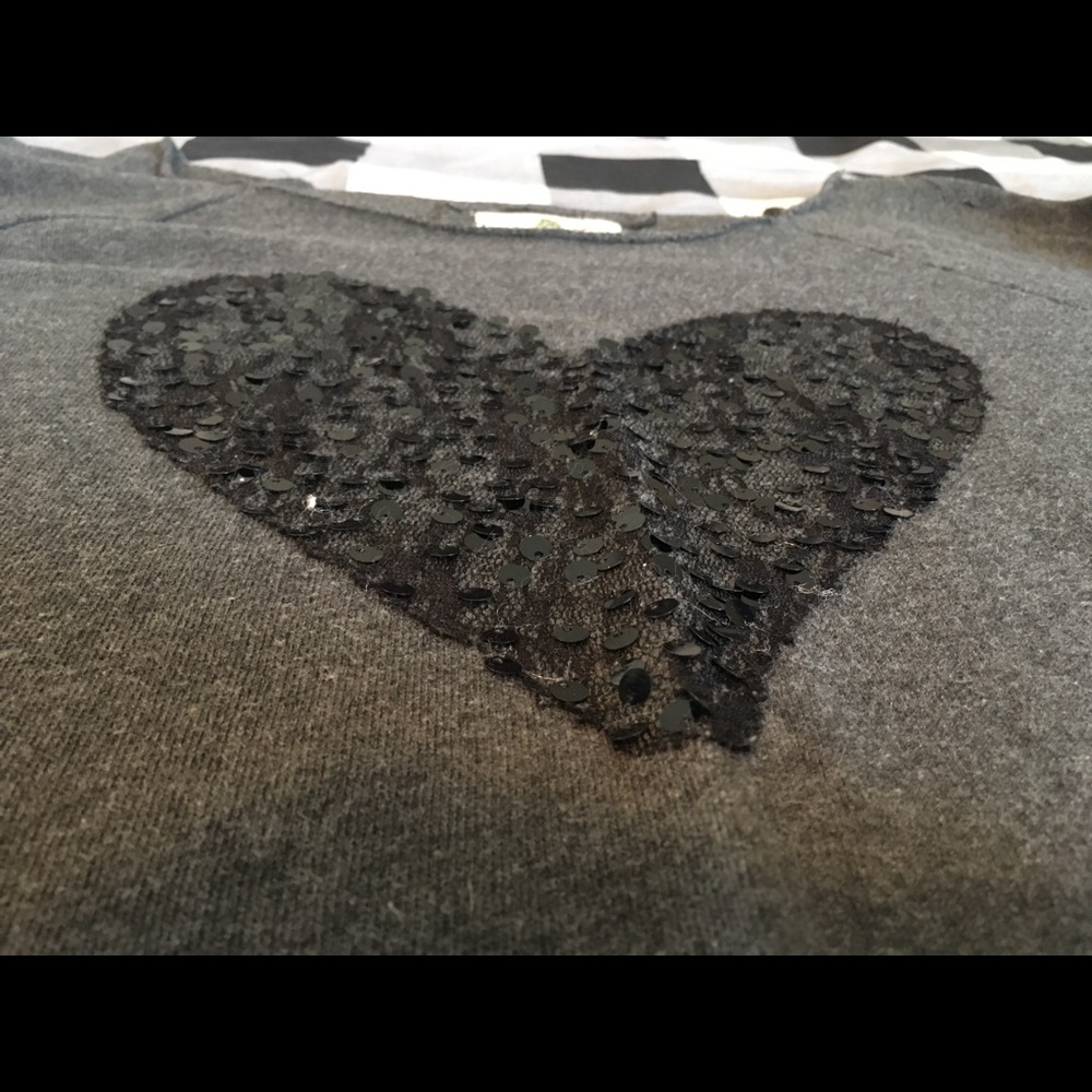 Off the shoulder sweater with heart detail